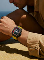 The Spectre N1 Black-Yellow, lifestyle — reclined on limestone