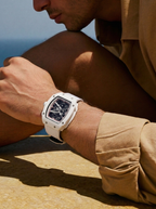 The Spectre N1 White-White, lifestyle — reclined on limestone