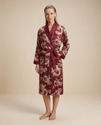 Palais Satin Robe — Burgundy, female styling with loose slicked-back hair on a plain beige background